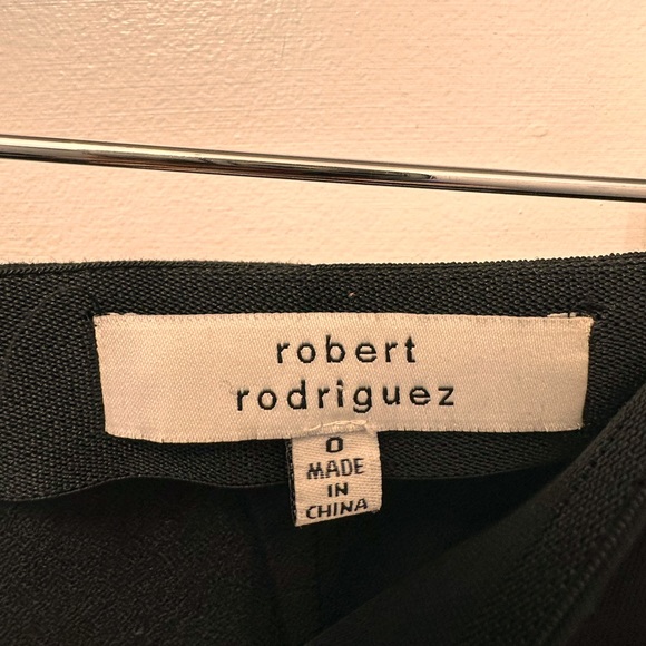 Robert Rodriguez black knee length skirt w/chrome cutouts, size0, zips both ways - Picture 2 of 3